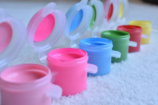 a bright set of acrylic paints for drawing