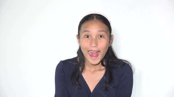 A Surprised Amazed Teen Asian Girl — Stock Video