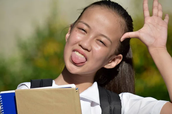Una Estudiante Haciendo Caras Graciosas —  Fotos de Stock