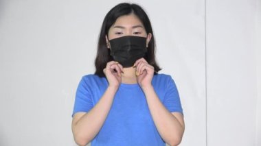 A Female Teen Wearing Facemask