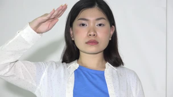 Female Teen Asian Civilian Girl Saluting — Stockvideo