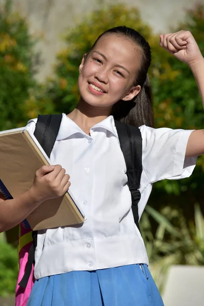 Молодая Азиатская Студентка Мускулы — стоковое фото