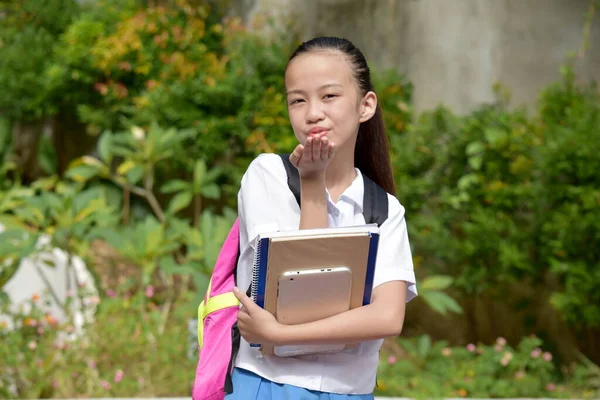 Young Asian Girl Student Blowing Kiss Textbooks — Stock Photo, Image