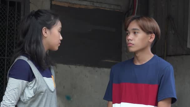 Asian Teens Or Siblings Staring At Each Other — Stock Video