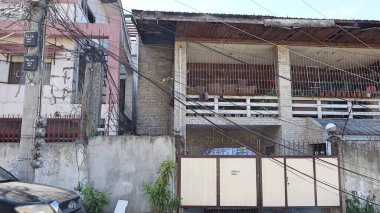 Old House With Fallen Telephone Cables