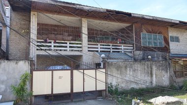 Philippine House With Fallen Electrical Wires