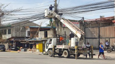 An Electrical Worker And Utility Truck