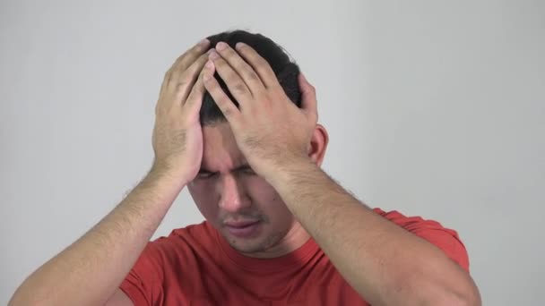 A Stressed Asian Man With Headache — Stok Video