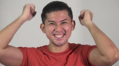 Mutlu bir Asyalı Kazanan