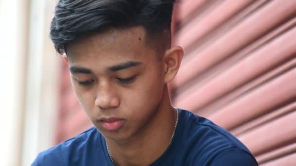 A Sad Asian Male Teen Boy — Wideo stockowe