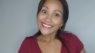 A Happy Adult Female Smiling