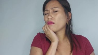 A Stressed Adult Female With Toothache