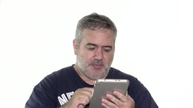 An Adult Male Using Tablet