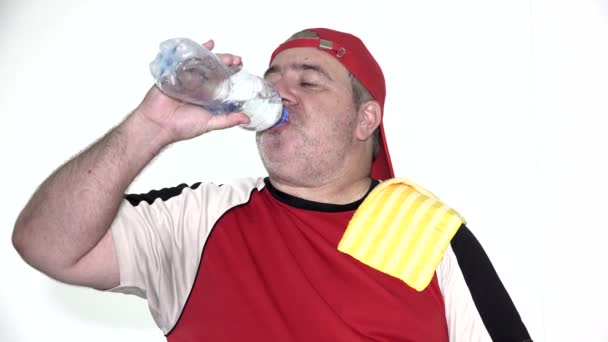 Fat Male Drinking Water Isolated — Stock Video