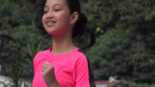 Female Asian Child Athlete Running — Stock Video