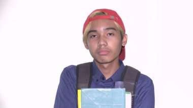 Serious Diverse Male Student Wearing Baseball Cap