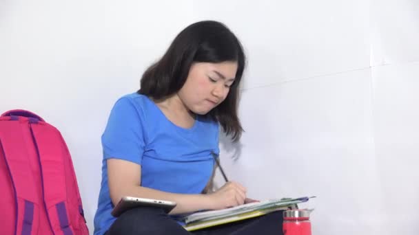 Asian Student Studying Writing Notebook — Stock Video