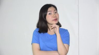 A Confused Asian Female Woman Talking