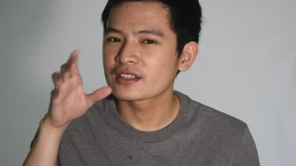 Alcoholic Asian Man Drinking Closeup Isolated — Vídeos de Stock