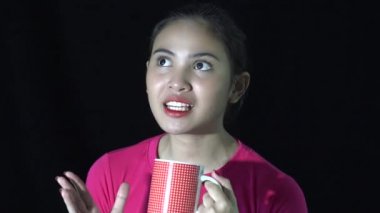 An Asian Woman With Coffee Cup