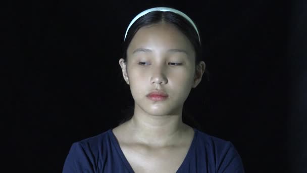 Serious Asian Teen Girl Isolated — Stockvideo