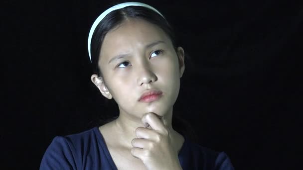 Cute Asian Teen Girl Thinking Isolated — Stockvideo