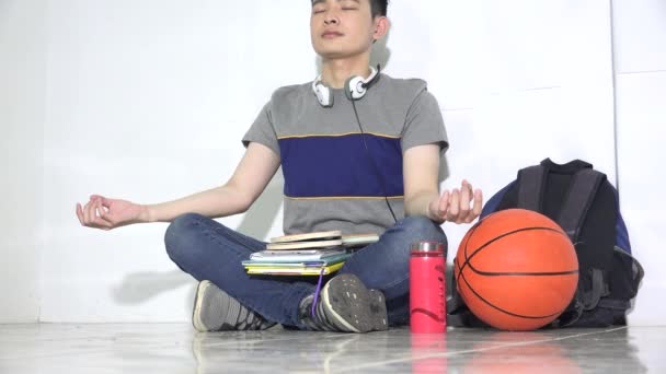 College Student Meditating Isolated — 图库视频影像