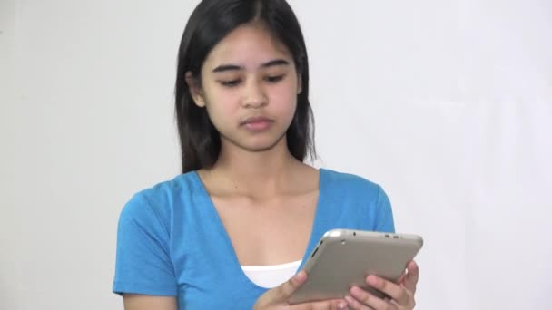 Serious Asian Woman Using Tablet Isolated — Vídeo de stock