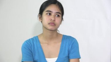 An Asian Woman Thinking Isolated