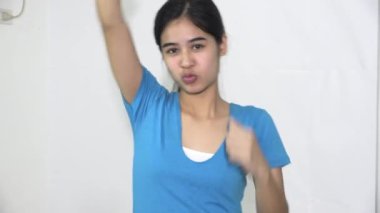 A Proud Female Asian Woman Isolated