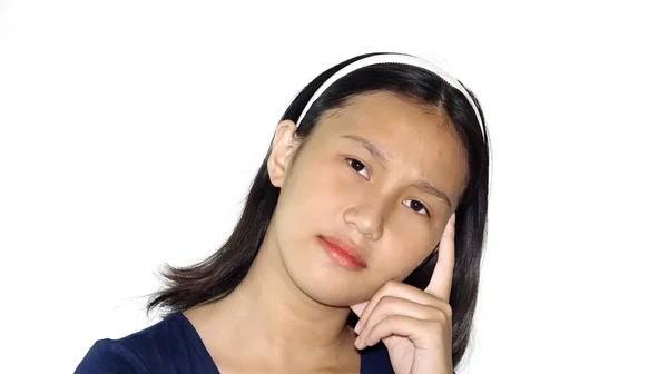 Young Filipina Teenage Female Thinking Isolated — Stockfoto