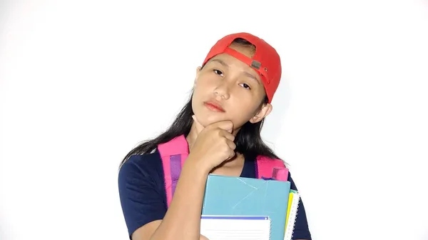 Förvirrad Asiatisk Kvinna Student Håller Böcker Isolerade — Stockfoto