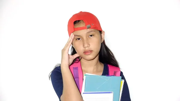 Stressed Asian Female Student Holding Books Isolated — Stock Photo, Image