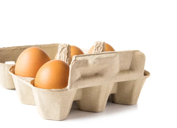 Egg box on white background — Stock Photo, Image