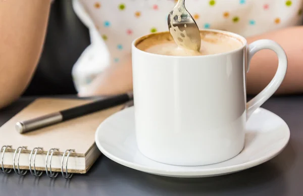 Coffee cup and saucer on table — Stock Photo, Image