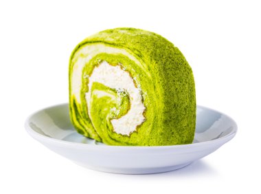 beyaz zemin üzerine yeşil çay rulo pasta