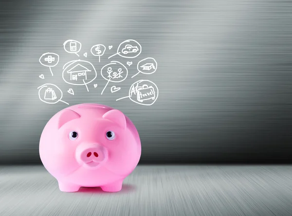 Pink piggy bank and icons design to represent the concept of saving money — Stock Photo, Image