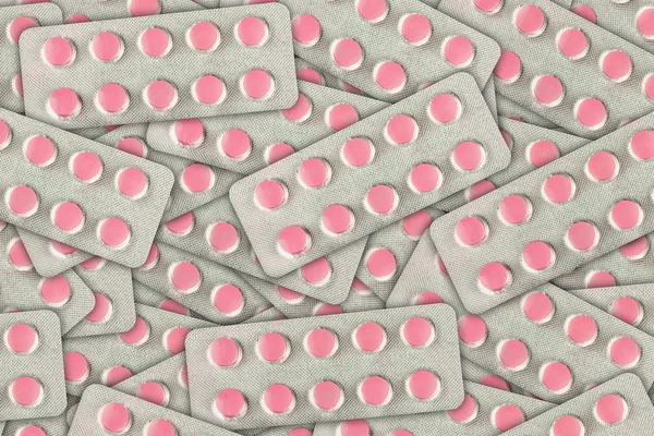 Comprimidos rosa embalados em blister — Fotografia de Stock