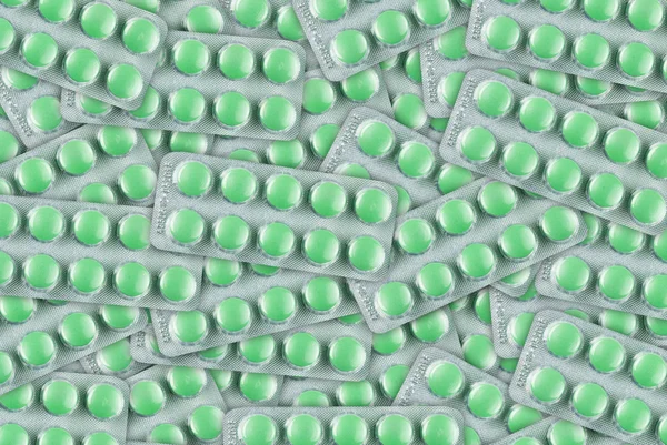Fond abstrait de pilules vertes en plaquette thermoformée — Photo