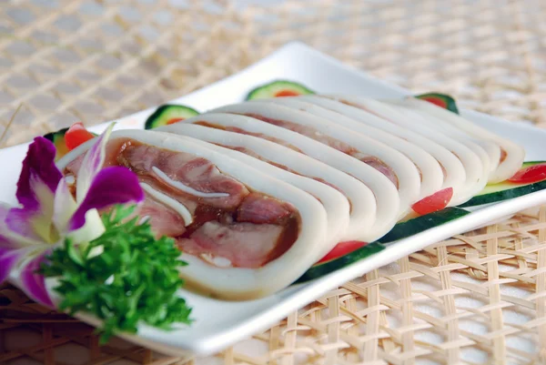 Wrap meat in squid — Stock Photo, Image