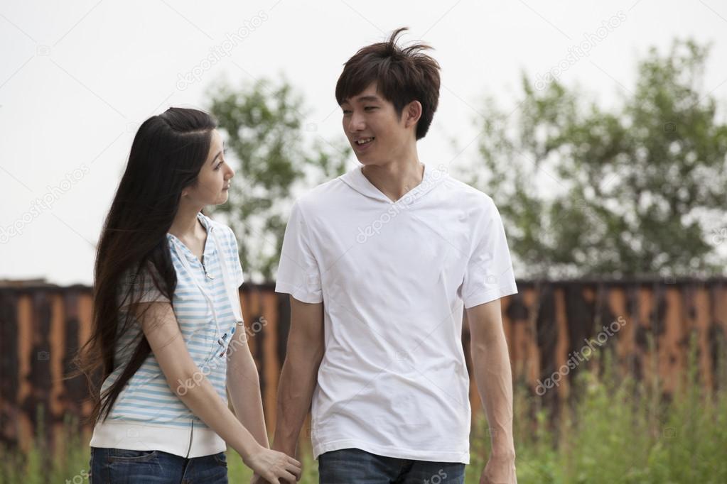 Outdoor young asian couple