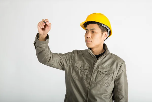 Construction worker writing notes — Stock Photo, Image