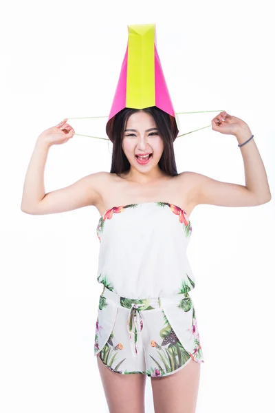 Young woman with shopping bags over white background — Stock Photo, Image