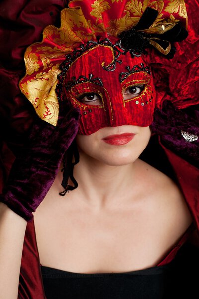 Woman Wearing Red Carnival Mask