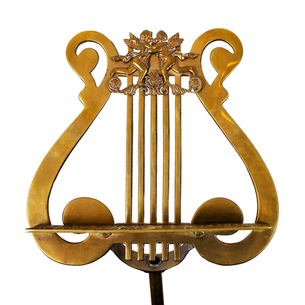 Support de musique antique, en bronze, sur fond blanc — Photo