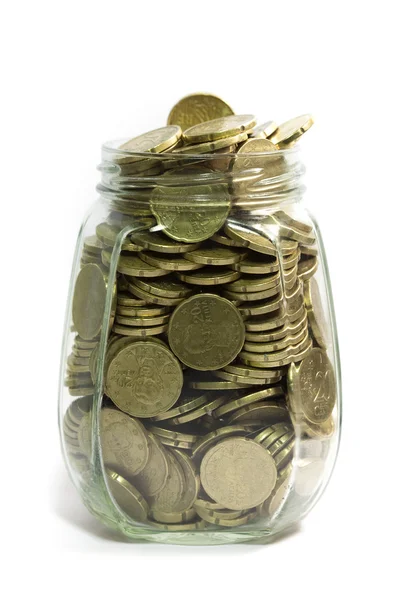 Pot rempli de pièces en euros, sur fond blanc — Photo