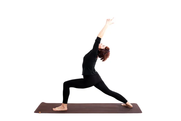 Mujer realizando ejercicios de yoga —  Fotos de Stock