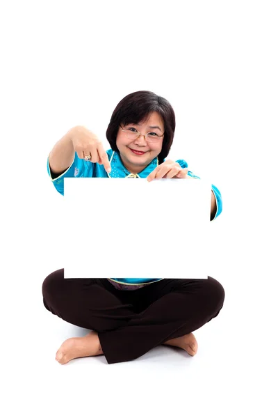 Chinese Woman showing a blank white board — Stock Photo, Image