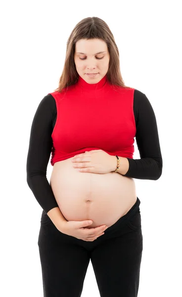 Zwanger vrouw strelen haar buik — Stockfoto