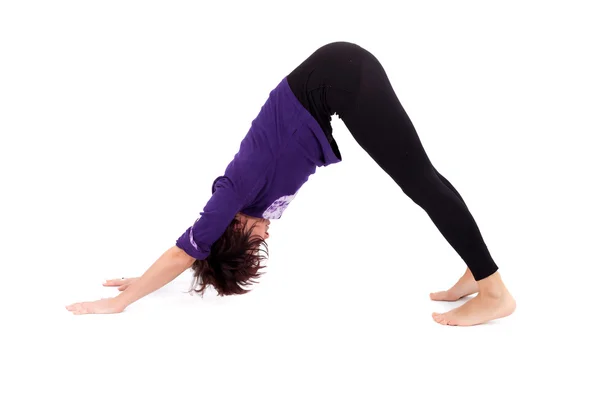 Mulher realizando exercícios de ioga — Fotografia de Stock